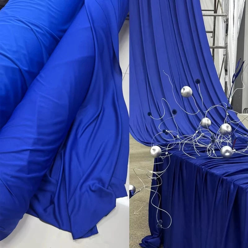 rideau tissu élastique soie lait bleu royal antidérapant moderne boules argentées