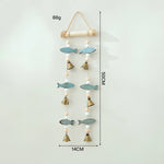 mobile mural poissons cloches bleu clair doré rustique