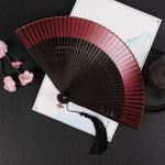 éventail pliant traditionnel vert foncé noir marron clair décoration mariage accessoire fête parfumé chinois
