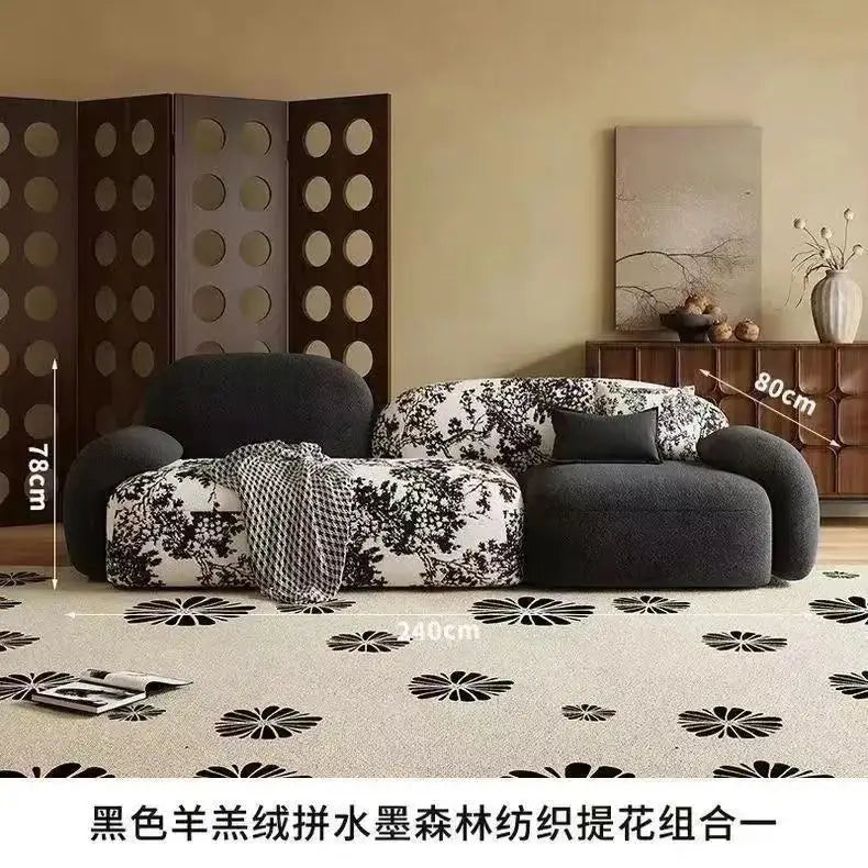 canapé moderne noir blanc fleurs motifs abstraits coussins plateau bois minimaliste italien scandinave