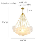 suspension lumineuse moderne boules sphériques blanc chaînes métalliques salon chambre principale étude