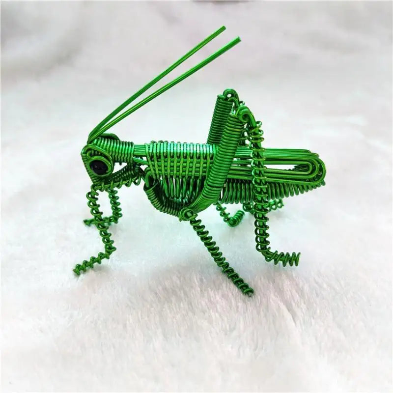 décoration créative insecte vert spirale métallique artisanal étagère unique adorable fait main exposé yeux