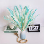 décoration intérieure bouquet pampas bleu blanc naturel vase bougie éléments