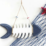 décoration murale plaque bois bleu marine squelette poisson corde bouées rouge bleu
