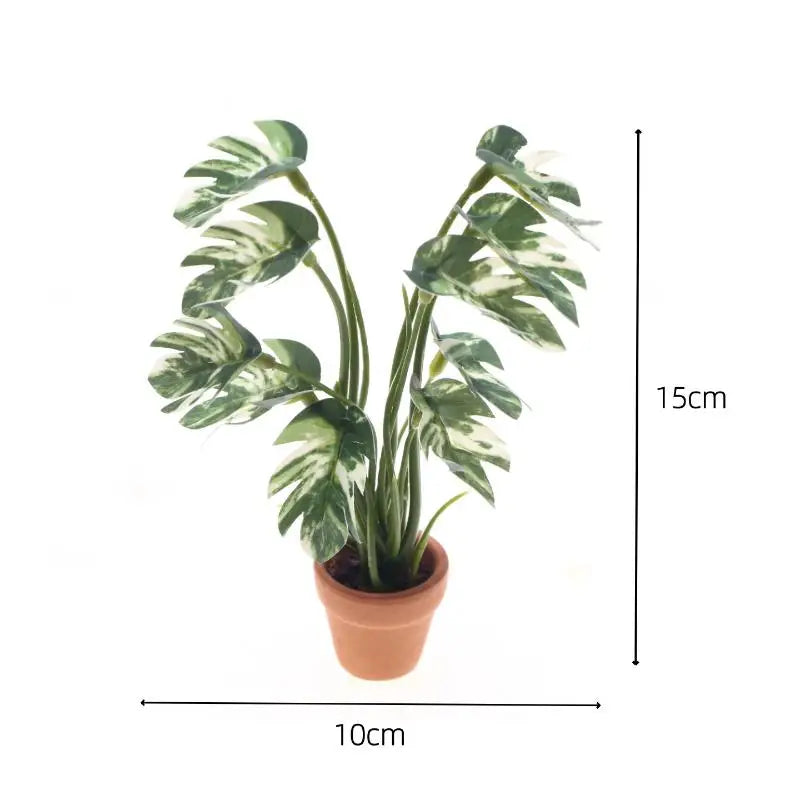 plante artificielle monstera pot terre cuite feuilles vertes blanches