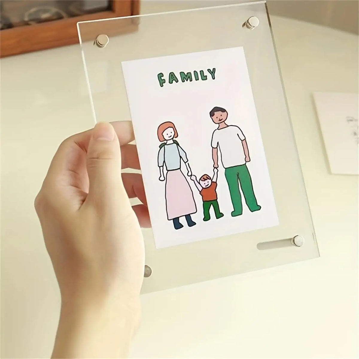 cadre photo transparent moderne acrylique rectangulaire lisse tringle métallique urbain famille paysageportrait