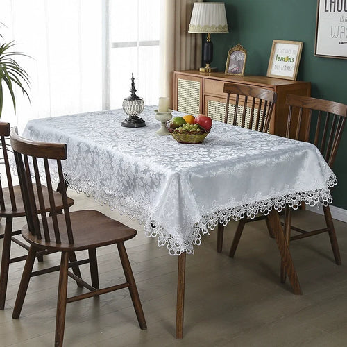 nappe table rectangulaire dentelle blanche broderie fleurs classiques élégante mariage banquet cuisine rustique