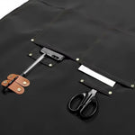 tablier ajustable imprimé logo brodé noël noir beige poche glissière ciseaux opaquet classique