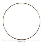 anneaux suspension dorés ronds concentriques métal opaques tailles variées moderneintérieurcoration minimaliste