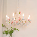 Chandelier suspendu bras fleurs roses feuilles shabby chic romantique lumière chaude