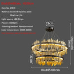 suspension lumineuse or contemporaine motifs géométriques texture pierre fixations chaînes haute luminosité