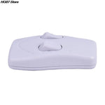 télécommande moderne blanc noir interrupteur bouton poussoir vis fixations rondes lisses