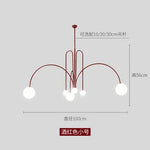lustre moderne rouge noir doré sphères blanches opaques suspension salon chambre