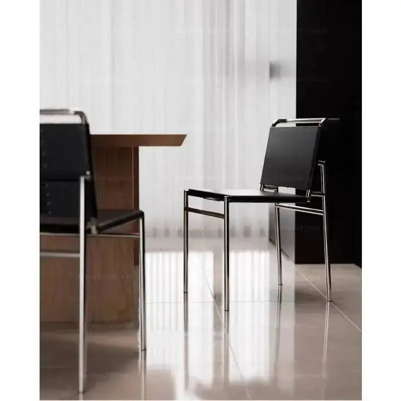 chaise moderne cuir couleur orange noir blanc tringles chromées contemporaine