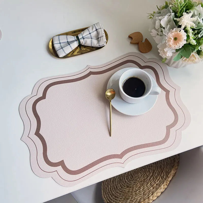 serviettes table moderne motif géométrique rose clair vert bleu beige ornementées