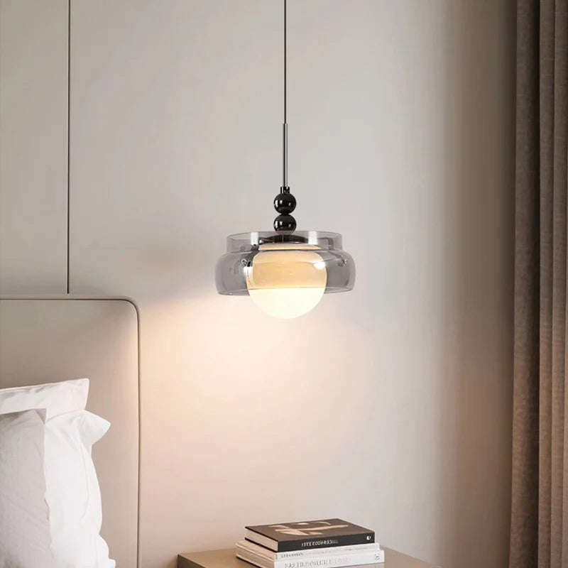 lustre moderne pendentif verre transparent effet fumé lumière blanc chaud salon chambrehôtel