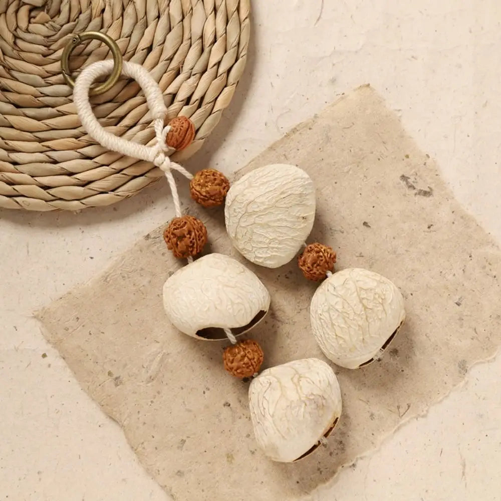 porte clés animal compagnie bois coquilles boho marron rouge naturel rustic anneaux métalliques