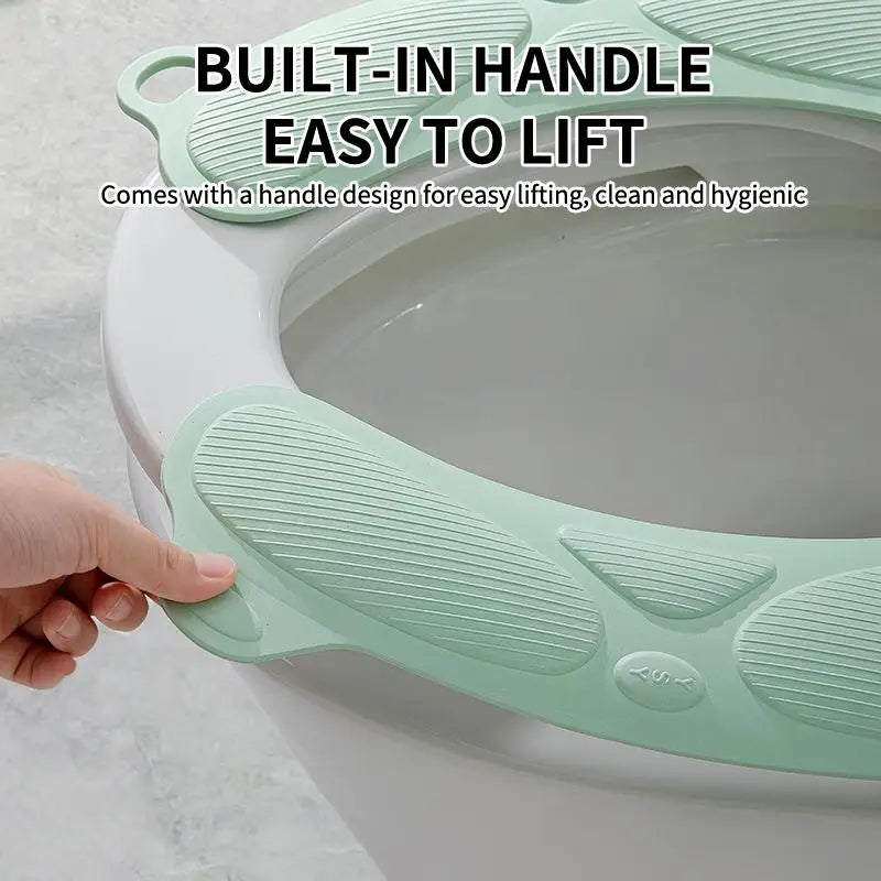 siège toilette amovible vert pastel antidérapant moderne adhésif poignée intégrée lavable réutilisable chambre