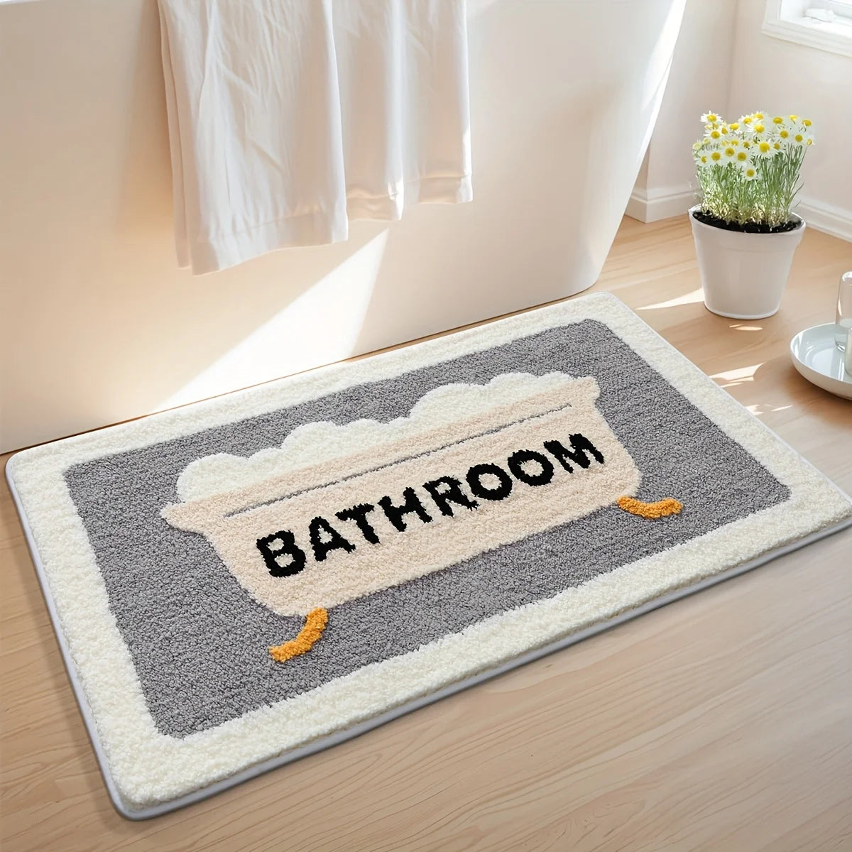 tapis bain moderne gris blanc noir orange motif baignoire arc ciel antidérapant