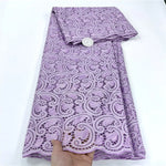 tissu dentelle coton blanc motifs floraux broderie strass robe couture luxe