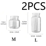 vases transparents modernes rayures verticales poignée métallique décoration intérieure table centrale pièces