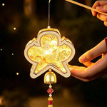 lampe suspendue artisanale or blanc rouge ornements floraux motifs géométriques cloche pompon anniversaire noël