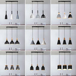 Lustre suspendu 3 lampes noir bois aluminium vu de face