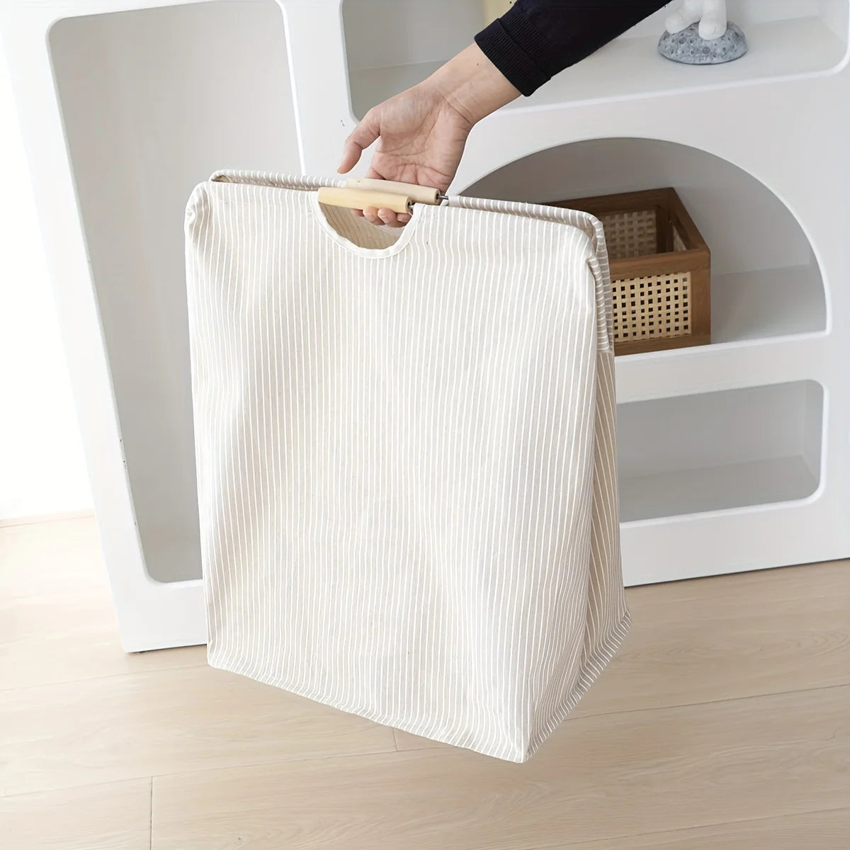 Détail des poignées du panier à linge imperméable Ombre Interieur