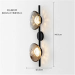lumière murale moderne verre texturé noir doré contemporaine deux ampoules LED