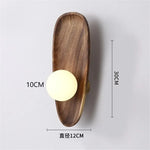 lampes murales modernes minimaliste bois marron foncé éclairage quotidien led fixées mur transparentes