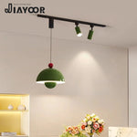 suspension lumineuse moderne vert beige rouge brillante câble suspendu minimaliste