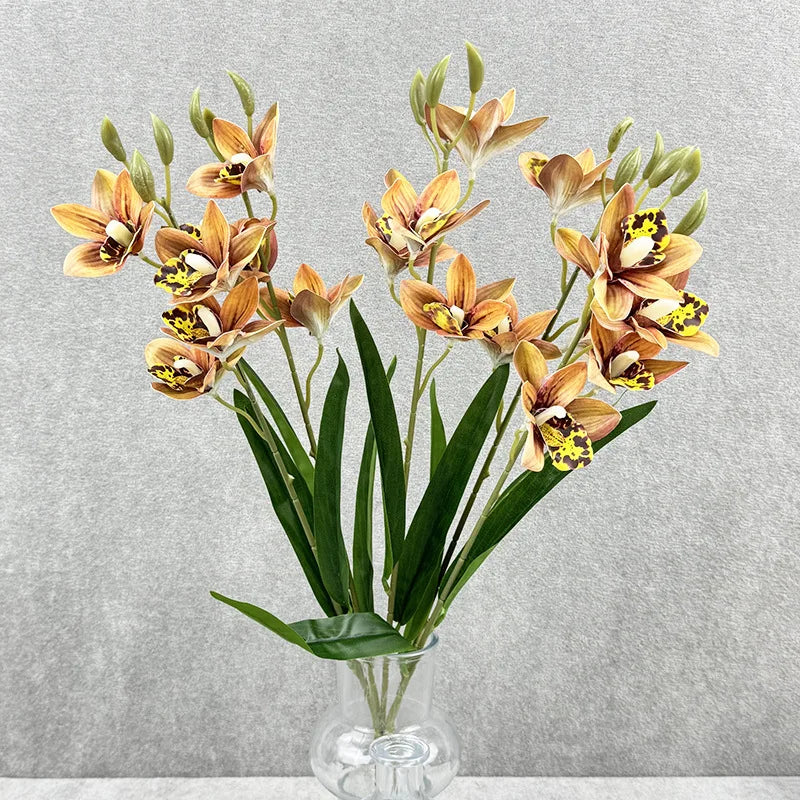 bouquet fleurs artificielles orchidées cymbidium roses blanches violettes jaunes décoration intérieure maison moderne minimaliste