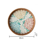 assiette plate décorative rotin tressé motif fleurs boho rustique couleur naturelle