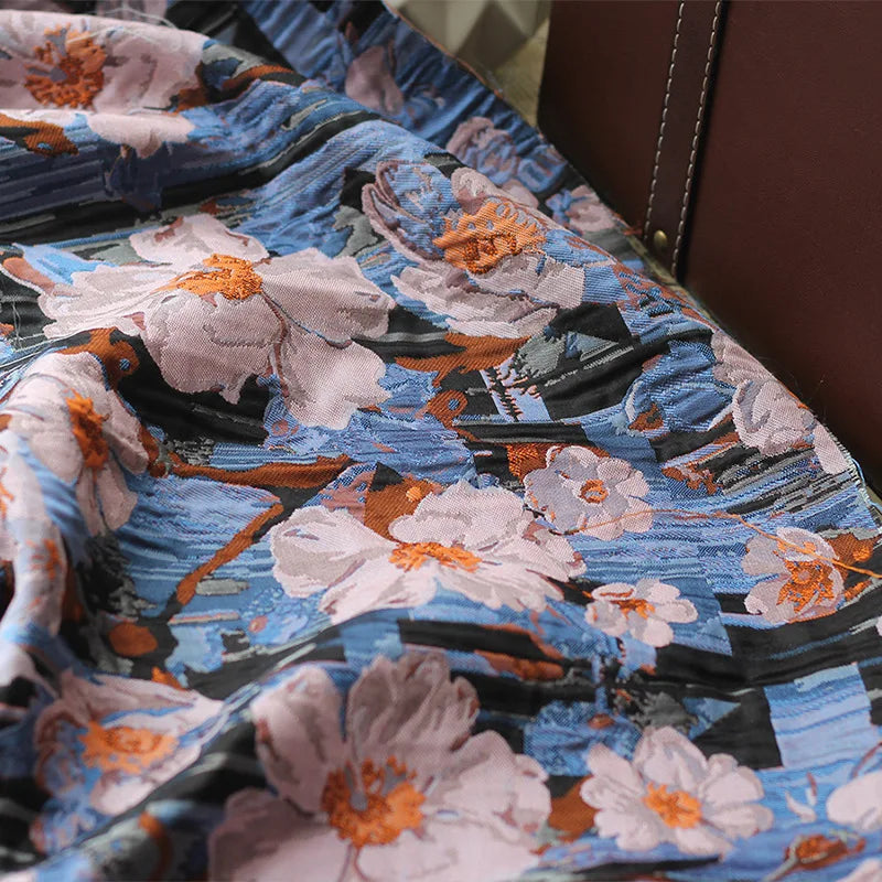 tissu imprimé fleurs blanches orange fond bleu noir résistant bricolage couture rétro 145cm