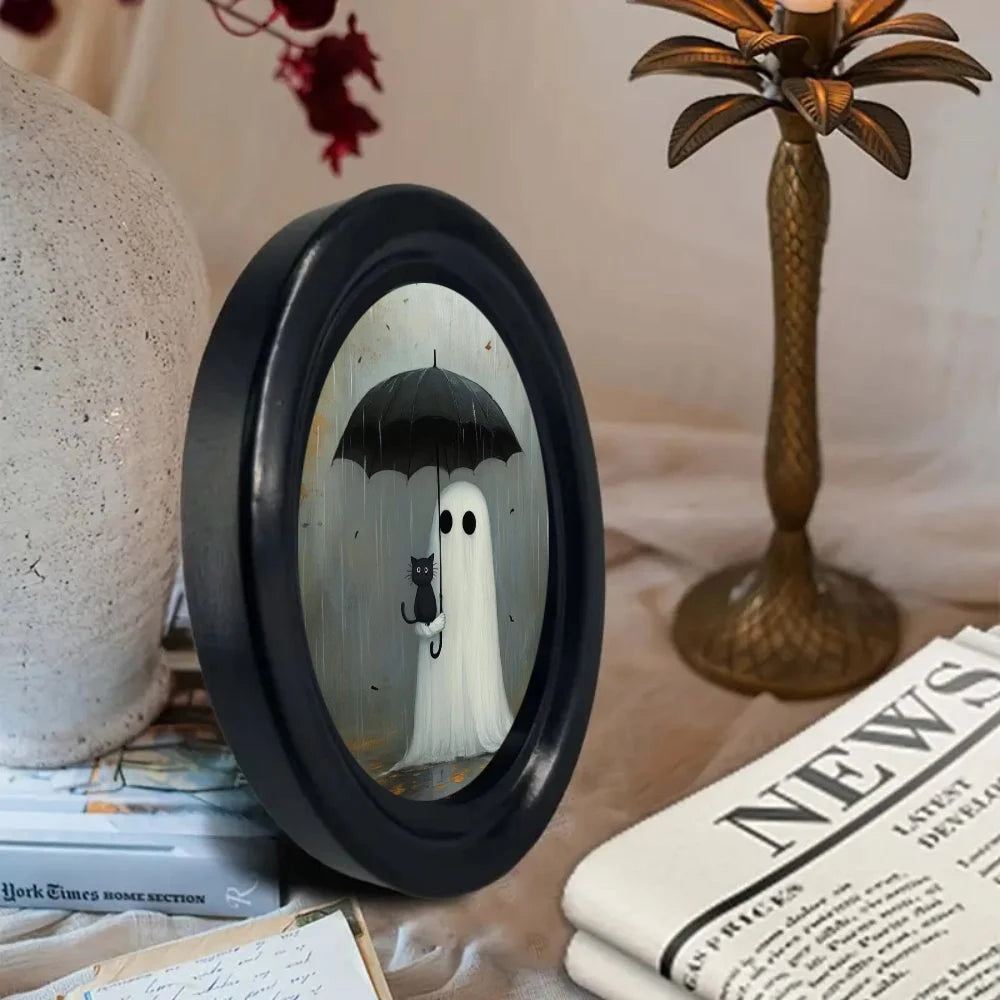 Décor mural ovale accroché dans un intérieur thématique Halloween
