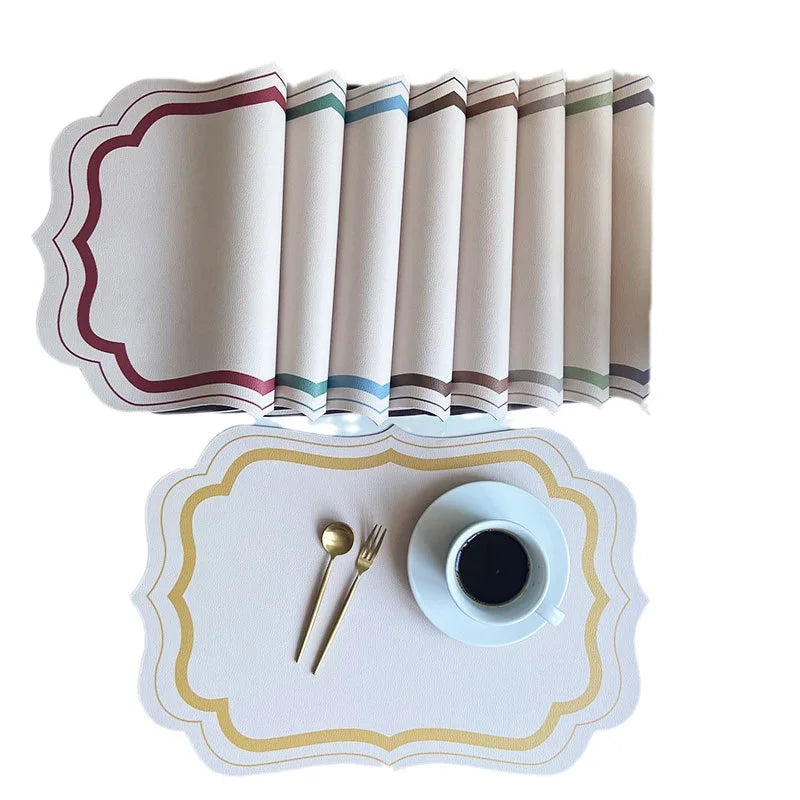 serviettes table moderne motif géométrique rose clair vert bleu beige ornementées