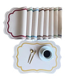 serviettes table moderne motif géométrique rose clair vert bleu beige ornementées