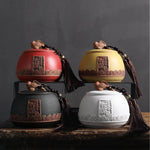 pot thé rouge jaune noir artisanal motifs floraux poisson chaîne pompon hermétique