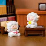 figurines mignonnes moutons résine couleurs variées visage souriant ruban cartoon