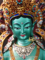 statue bouddhiste tara verte cuivre détails floraux motifs géométriques art tibétain doré