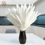 décoration boho bouquet plumes blanches douces intérieur anniversaire mariage