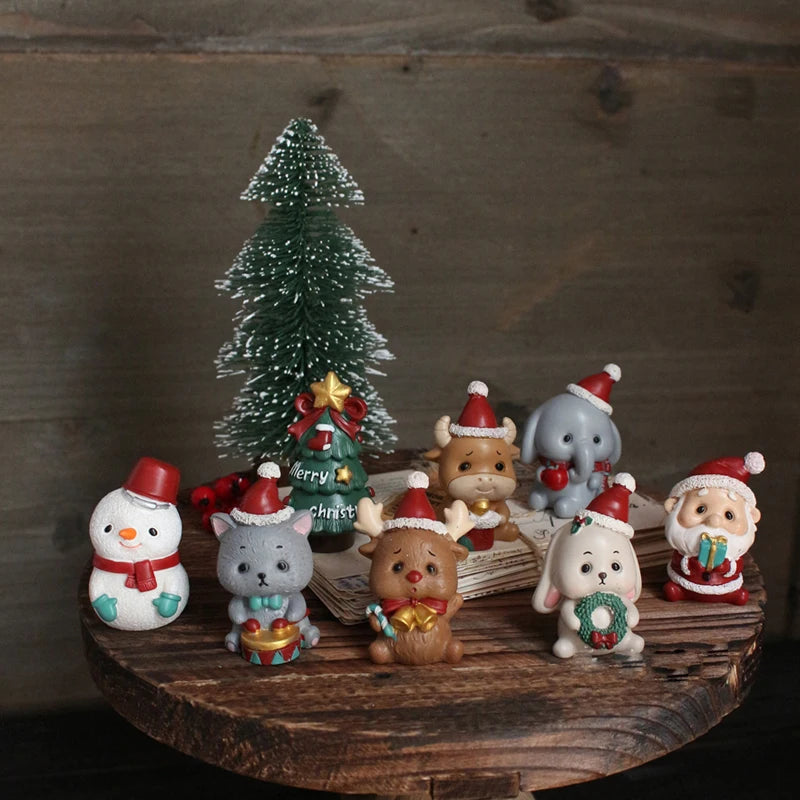 Ornement Noël résine famille animaux vert armée