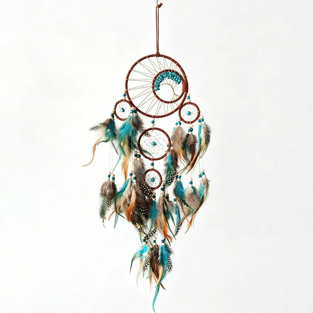 décoration murale attrape rêves boho chic plumes colorées textiles marron bleu gris