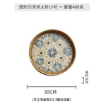 plateau rond rotin coquillages feuilles naturelles décoration boho assiette fruits pain petit déjeuner