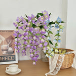 décoration intérieure moderne bouquet fleurs cloches vase transparent anniversaire événements