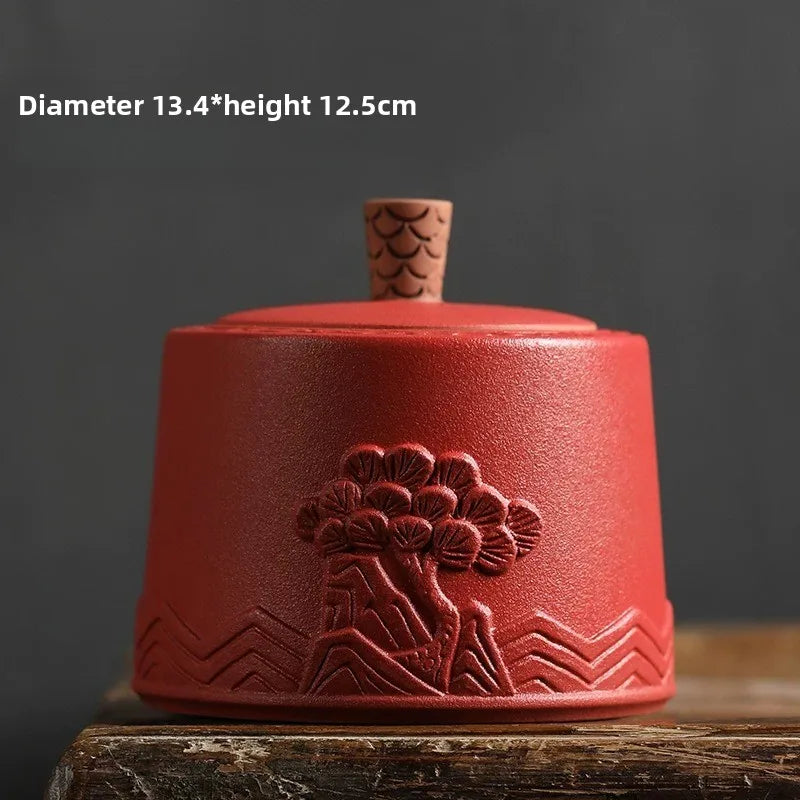 pot thé rouge jaune noir artisanal motifs floraux poisson chaîne pompon hermétique