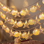 décoration intérieure guirlande lumineuse étoile mer coquillage thème marin festif anniversaire noël