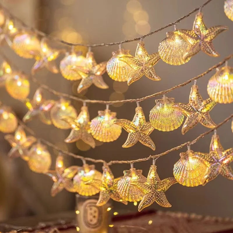 décoration intérieure guirlande lumineuse étoile mer coquillage thème marin festif anniversaire noël