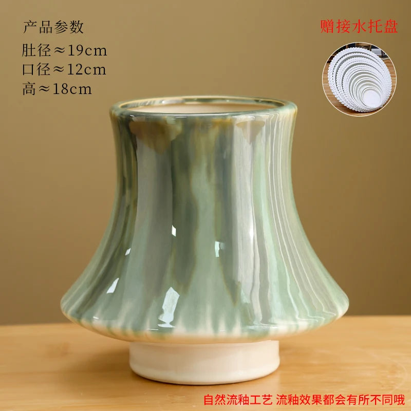 Un bol élégant en céramique glaçurée avec un design de vague ondulée, offrant une belle décoration pour la maison ou la cuisine.