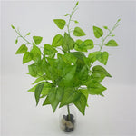 plantes artificielles violet vert marron feuilles ovales moderne décoration extérieure vase galets noirs blancs